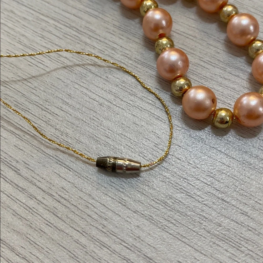 Faux pearl necklace
